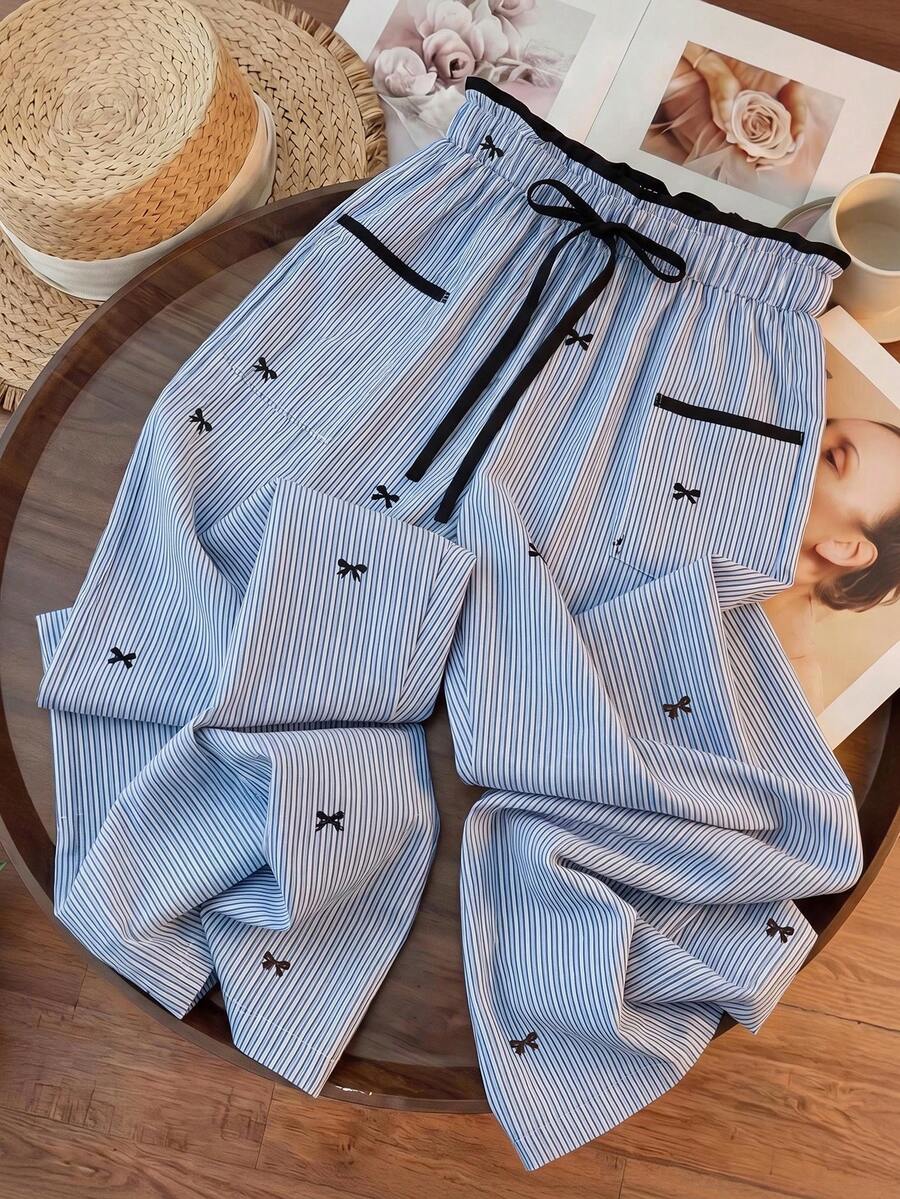 GlowEve Pantalones rectos de mujer de cintura alta con bolsillos, detalles a rayas y lazo, estilo casual y holgado, para verano - Azul - Ver 1