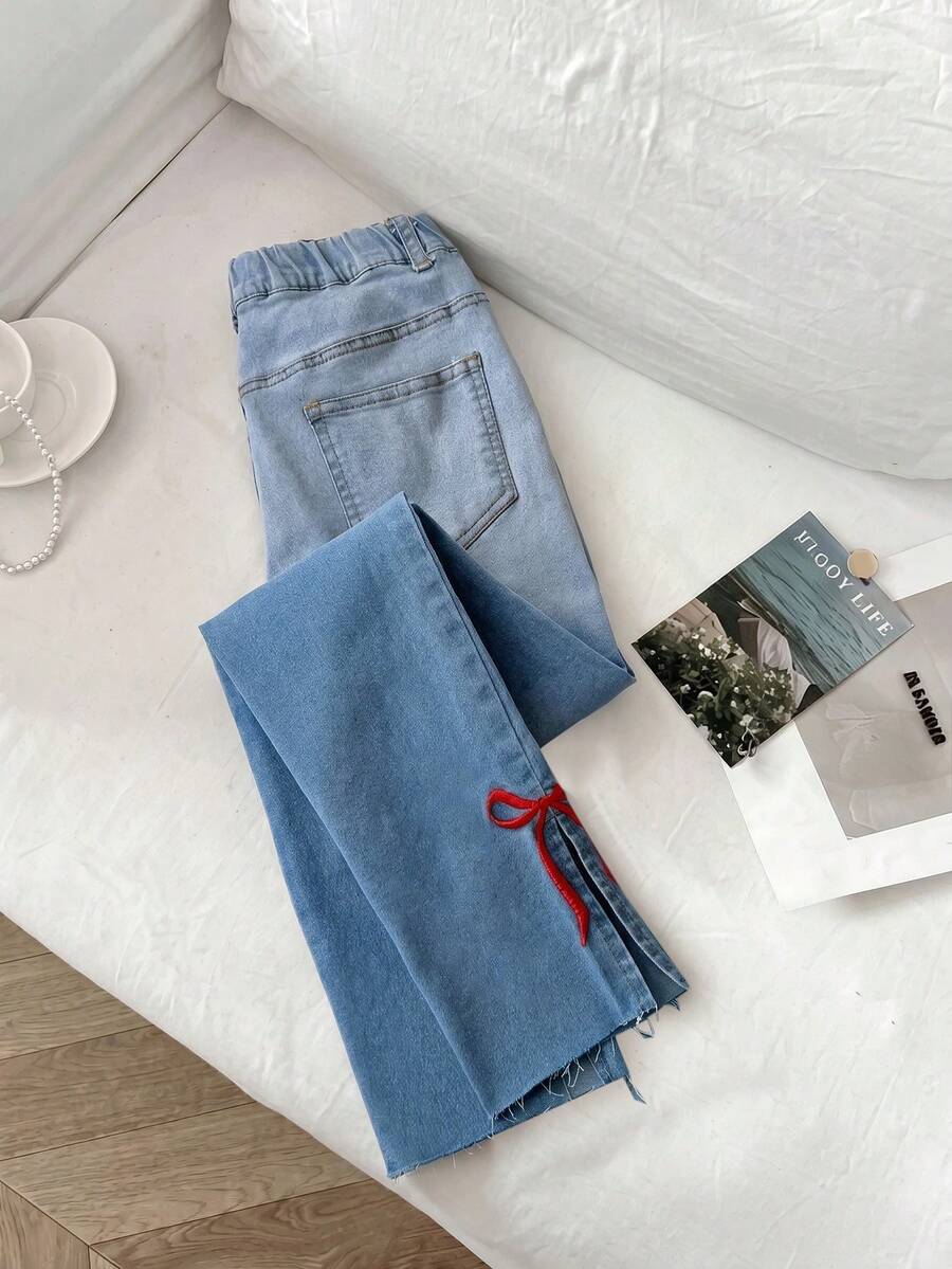 SHEIN Tween Mädchen Jeans Skinny, weich, Baumwolle, lässig, stilvoll, vielseitig, bequem für den Alltag und einfach. Merkmale sind ein geschlitzter Saum und ein besticktes Schleifenmuster. Die schmale Passform und der Stretch-Denim mit weißem Spray-Wash sind geeignet für Lässig, Urlaub und den Alltag. - Helle Waschung - Übersicht 1