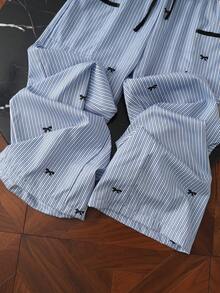 GlowEve Pantalones rectos de mujer de cintura alta con bolsillos, detalles a rayas y lazo, estilo casual y holgado, para verano - Azul - Ver 7