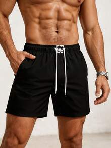 Manfinity KASUA Pantalones de playa para hombre con cordón, unicolor, patchwork, estampado de plantas y bolsillo - Negro - Ver 3