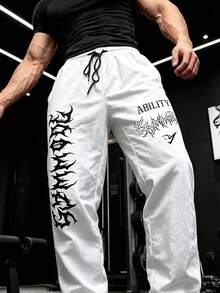 GymBeat Men's Casual Sports Drawstring Waist Slogan Print Long Pants - Black - View 1