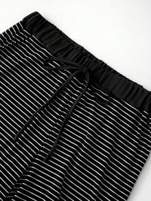 GlowEve CURVE Plus Size Solid Color Knit Cardigan With Front Button Closure, Striped Trim, Slim Fit, Drawstring Detail, Elegant Casual Commuter Daily Outing Long Pants - Black and White - View 8