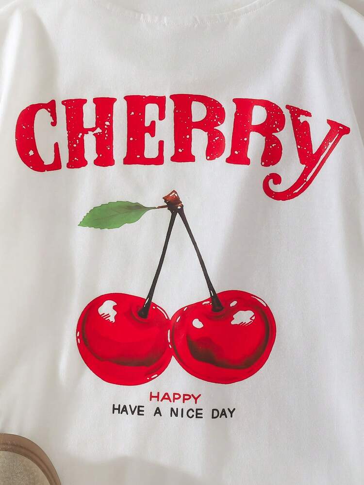 THE HAPPY LOOK مجموعة من قطعتين للبنات الصغيرات: ملابس علوية علوية محبوكة بنمط فاكهة كرتوني ناعمة برقبة دائرية وأكمام قصيرة مع شورت مربعات - الأحمر - مشاهدة 3