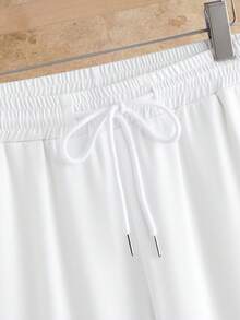 HIMLAND Conjunto de camisa de manga corta con botones y media tapeta texturizada y pantalones cortos con cintura de cordón para hombres - Multicolor - Ver 7