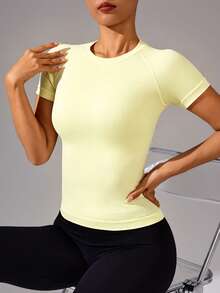 Easithlete Easithlete Women's Solid Color Raglan Short Sleeve Crew Neck Seamless Sports T-Shirt - Light Yellow - View 5