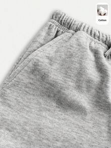 SHEIN Pantalones largos casuales holgados de unicolor de punto para niña preadolescente - Gris - Ver 5