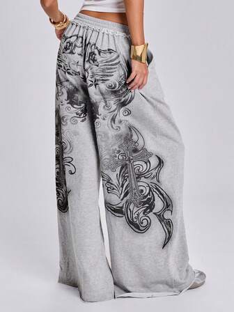 Pantaloni della tuta da donna stile Y2K street style primavera/estate per festival musicali e sportivi, con stampa slogan a croce e ali sulla schiena, gamba dritta ampia e vita bassa