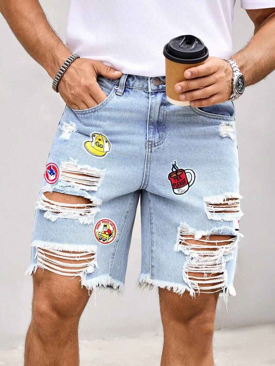 Manfinity LEGND Shorts de mezclilla casuales diarios para hombres con bolsillo, botón, diseño desgastado y patrón de dibujos animados, para vacaciones - Lavado ligero - Ver 1