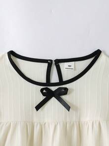 SHEIN Casuvi Kids 2件組女童春夏季新款休閒通勤套裝，波浪條紋編織蝴蝶結裝飾圓領荷葉袖寬鬆杏色上衣搭配簡約百搭黑色編織直筒長褲，日常出遊穿搭 - 彩色 - 查看 6