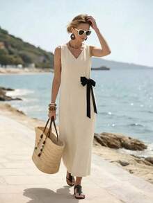 Isle Nomé Vestido largo sin mangas con cuello en V beige para mujer con detalle de lazo asimétrico en contraste negro, versátil para vacaciones de verano y diversas ocasiones - Blanco y Negro - Ver 4