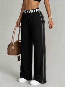 Dewbera Dewbera 春夏秋女款寬鬆顯瘦拉長腿長運動長褲，附口袋、腰帶拼接、運動標語、高彈力橡皮筋、直筒寬腿褲、撞色條紋拼接、開衩褲腳，適合日常休閒、跑步、瑜珈、健身房、網球、高爾夫等 - 黑色 - 查看 5