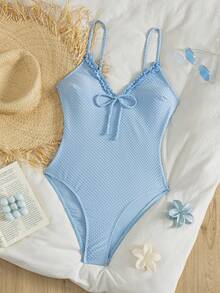 Swim Mod Women's Casual Versatile Playful Solid Color Frill Trim V-Neck + Bow Tie High Cut One-Piece Swimsuit (Puff Textured Fabric), Suitable For Vacation Beach - Blue - View 7