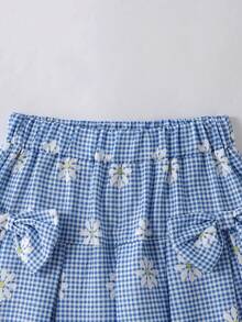 Casuvi Kids 2件/套 女童春夏季白色針織圓領荷葉袖T恤，配藍色蝴蝶結前裝飾 & 藍色梭織素色半彈性腰裙配2個蝴蝶結，適合日常穿著、旅行、度假、派對 - 藍白色 - 查看 7
