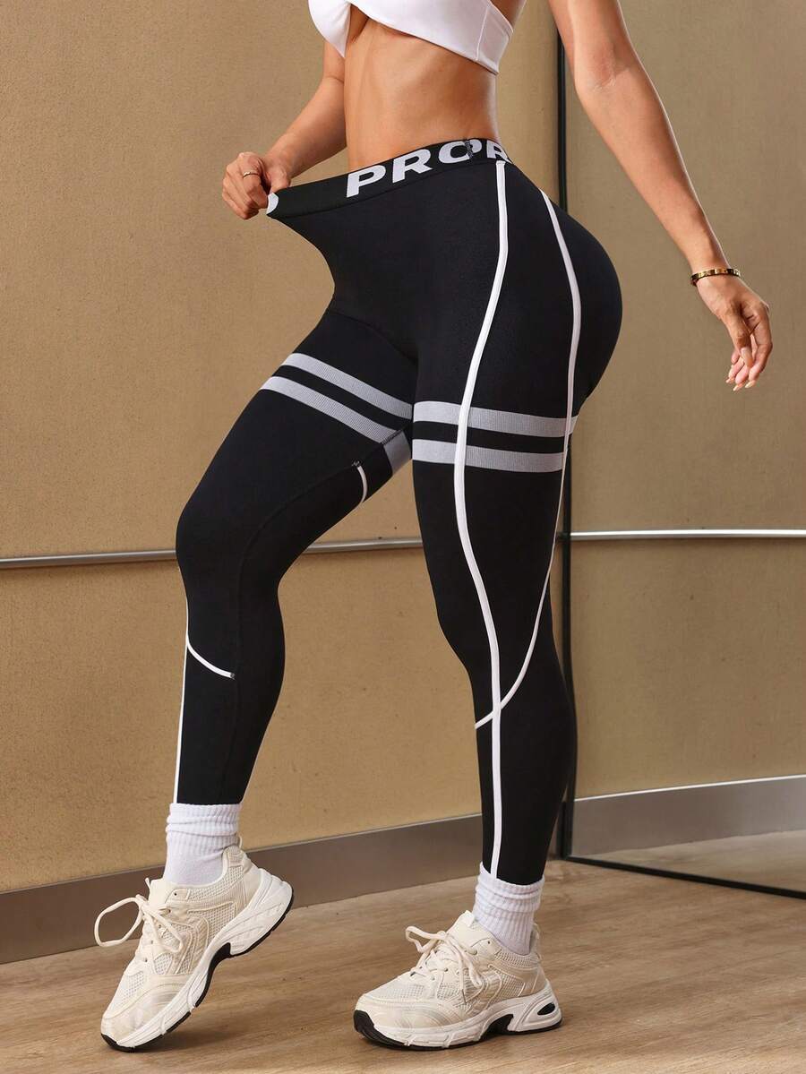 Slayform Legging Olahraga Tanpa Jahitan Pinggang Tinggi Bergaris Warna Kontras - Hitam - View 1