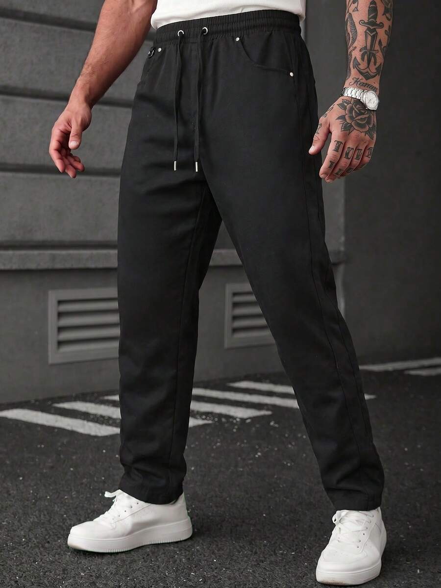 Manfinity CasualCool Celana Panjang Hitam Pria, Desain Tali Serut, Saku dengan Hiasan Paku Keling, Serbaguna, Cocok untuk Semua Musim, Pakaian Kasual Jalanan, Liburan Musim Gugur, Gaya Y2K - Hitam - View 1