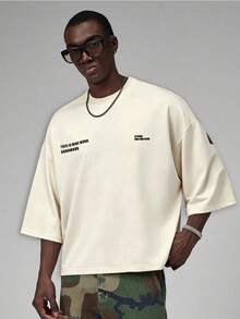 STYNVO Men's Slogan Print Crew Neck Drop Shoulder Loose Fit Casual T-Shirt - Apricot - View 2