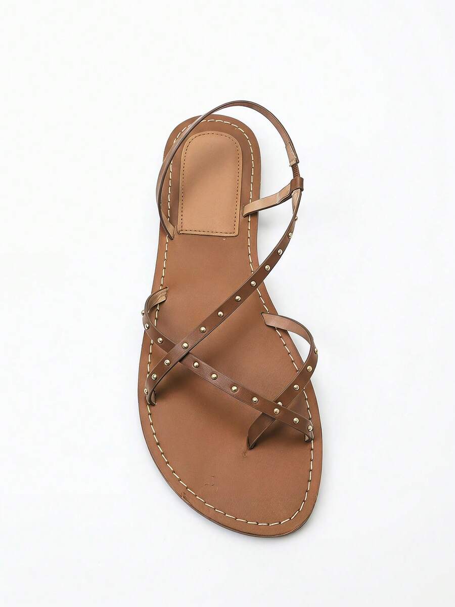 Nöista Flat Sandal With Crisscross Straps Adorned With Small Gold Studs. Summer Shoes - Brown - View 1