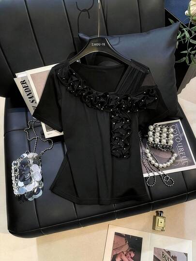 GlowEve CURVE Top de punto de manga corta con rosa de strass asimétrica de color liso elegante para mujer talla grande, adecuado para ir al trabajo y reuniones en verano