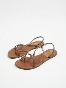 Nöista Flat Sandal With Crisscross Straps Adorned With Small Gold Studs. Summer Shoes - Brown - View 3