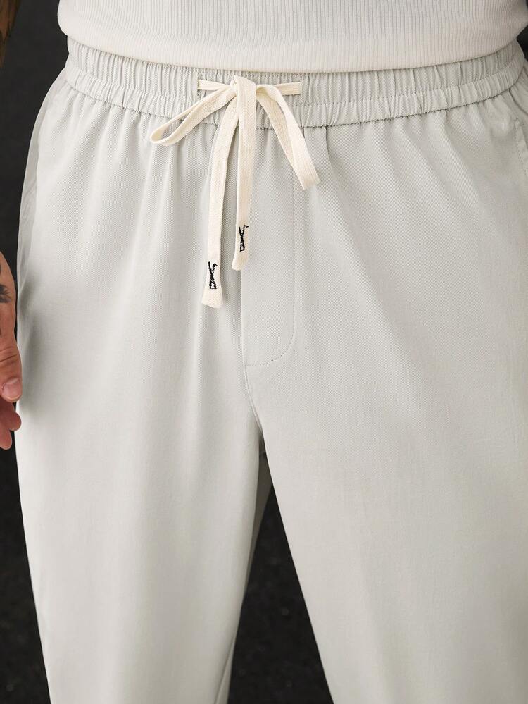 SLATEMANN Pantalones casuales de negocios holgados con cintura de cordón y bolsillos para hombres - Beis - Añade 3
