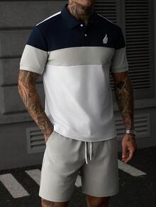 Manfinity CasualCool 男士極簡風半開襟鈕扣短袖拼色 Polo 衫與抽繩腰口袋短褲套裝 - 藏蓝色 - 查看 5