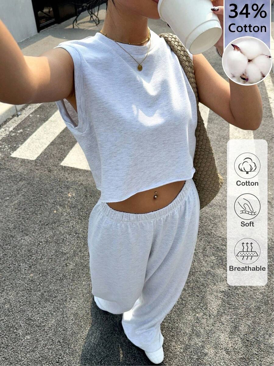 黄色宽松短袖露脐上衣和裤子套装，休闲百搭的青少年服装，舒适柔软的设计，适合度假、日常穿着以及春夏季节。 - 灰色 - 查看 1