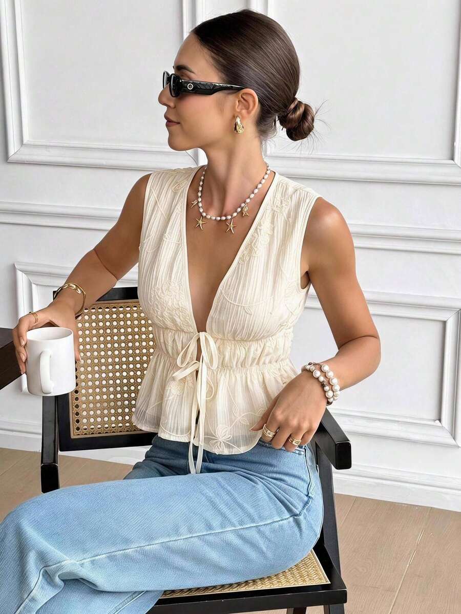 Serisse Women's Floral Embroidered Deep V-Neck Front Tie Sleeveless Vacation Top - Apricot - View 1