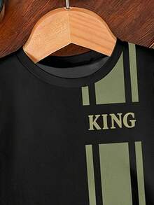 小男孩酷炫趣味英文標語 KING 圖案設計，時尚圓領短袖T恤與運動短褲套裝，適合度假派對、春夏季輕鬆舒適，夏季必穿之選，時尚休閒穿搭，春夏季街頭風，戶外休閒穿著，返校聚會，適合戶外活動 - 彩色 - 查看 4