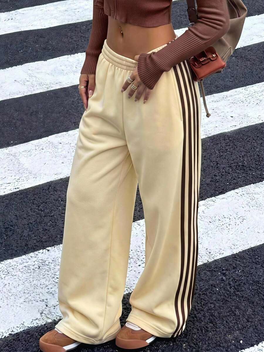 SHEIN Pantalones de chándal holgados casuales con patchwork de cinta de contraste color crema y amarillo para adolescentes - Amarillo - Ver 1