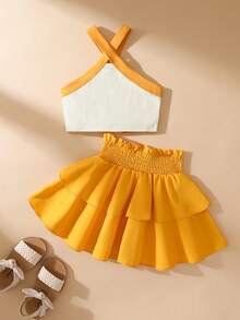 SHEIN Elladie kids Mädchen Urlaub Lässig Neckholder Ärmellos Figurbetontes Blumenmuster Tanktop, Elastischer Bund Einfarbig Rüschen Gestufter Rock, 2-teiliges Set, Pastorale Landhausstil, Strandurlaubsstil, Tägliche Lässig Ausflüge, Sommer, Sommerkleid, Sommeroutfit - Gelb - Übersicht 2