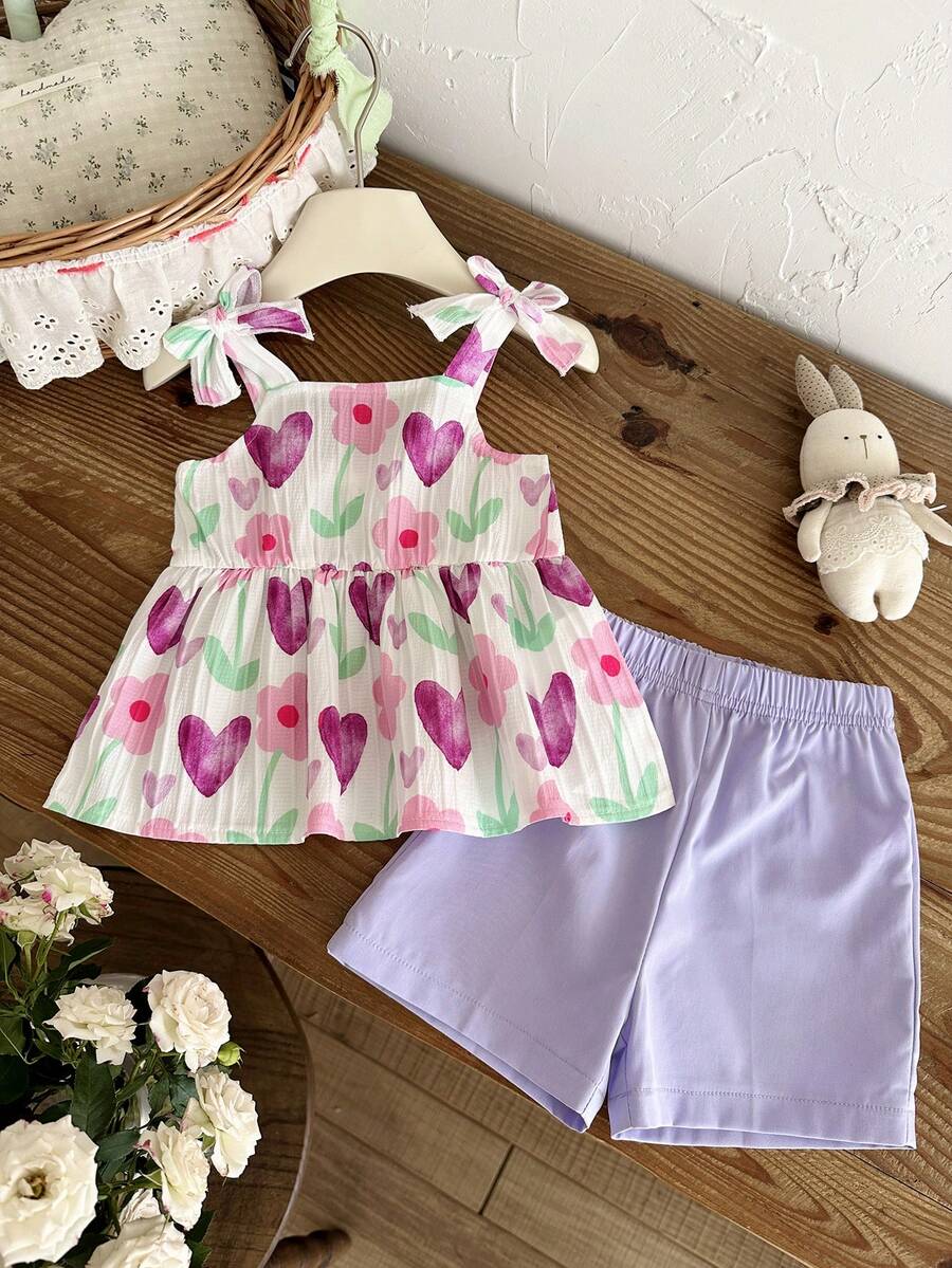 SHEIN Vintaside Kids 2件組女嬰心形圖案花卉印花背心上衣配蝴蝶結與短褲套裝，甜美可愛 - 紫色 - 查看 1