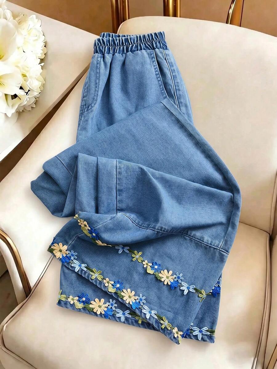 GlowEve CURVE Plus Size Women's Floral Embroidered Pocket Loose Casual Denim Jeans - Blue - View 1