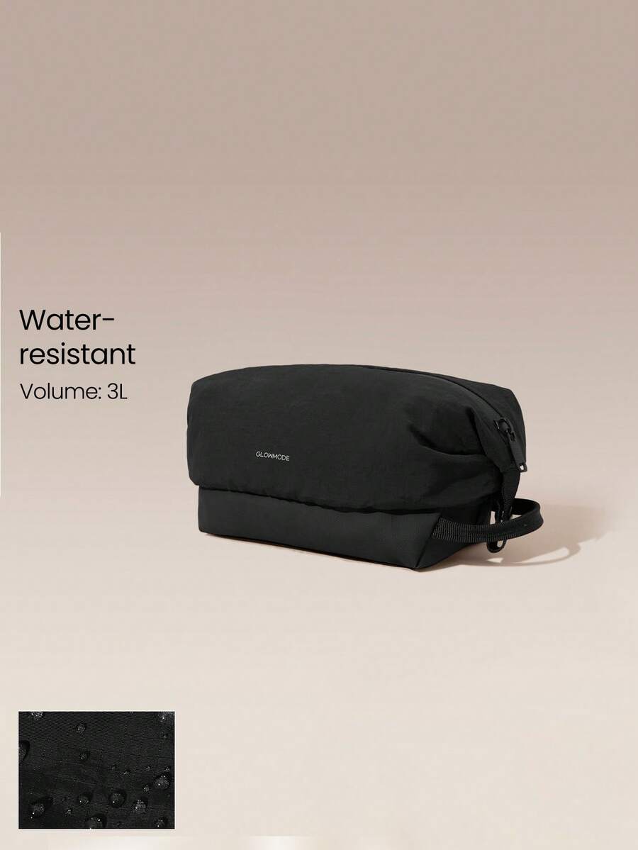 GLOWMODE Bolsa de aseo impermeable CompactGo pequeña de 3L, bolsa de viaje resistente al agua con compartimento con cremallera, base antideslizante, ligera, organizadora para viajes, gimnasio y transporte - Negro - Ver 1