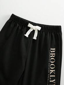 SHEIN 2件/組兒童青少年男孩休閒百搭印花圖案混搭粗細羅紋圓領短袖T恤與慢跑褲針織套裝，男孩服裝，運動長褲，男孩夏季服裝，套裝，校服上衣，返校服裝男孩，黑色圖案T恤，秋季長褲 - 彩色 - 查看 5