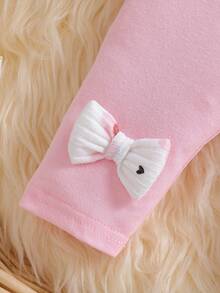 SHEIN Newborn Spring/Autumn Pink Soft Style Heart All-Over Print Pink Bow Knot Embellished Knit Pullover Top With Matching Pink Bow Knot Embellished Long Pants Slim Fit 2-Piece Set Suitable For Outings, Casual, Sports, Christmas, Parties - Baby Pink - View 4