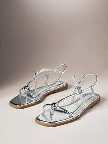 SHUZIA Women's Minimalist Elegant Metal Ring Decor Sling Back ThongFlat Sandals - Silver - View 7