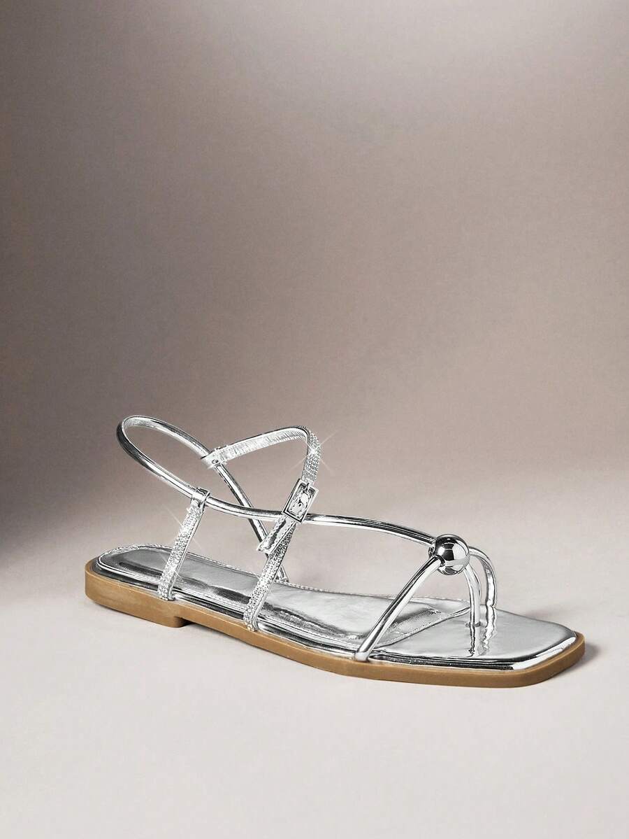 SHUZIA Women's Minimalist Elegant Metal Ring Decor Sling Back ThongFlat Sandals - Silver - View 1