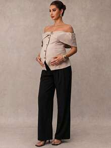 MaterniChic A Maternity Blouse With Metal Button Embellishments, A Slit Hem, And Off-The-Shoulder Design, In Apricot Color, Perfect For An Elegant Summer Look. - Khaki - View 10