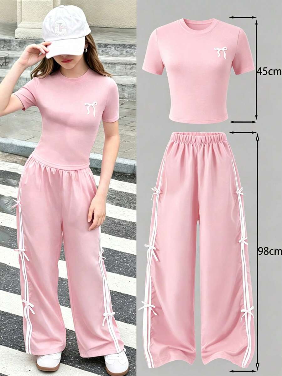 SHEIN Setelan 2 potong untuk remaja: Atasan lengan pendek putih dan celana panjang hitam dengan pita pink, cocok untuk musim semi/panas, olahraga, kasual, dan penampilan imut untuk kembali ke sekolah. - Berwarna merah muda - View 1