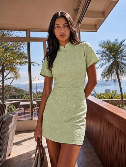 Nöista Fitted Mini Dress With Mandarin Collar And Diagonal Front Placket, Jacquard Fabric In Green Color.Summer Outfit, Spring Vacay, Holidays, Vacation Vibe