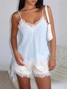 Briarwyn Canottiera da donna con patchwork in pizzo e orlo asimmetrico, top fashion - celeste - Visualizzare 2