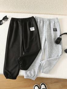 SHEIN 2 piezas Pantalones largos holgados bordados cómodos y casuales para uso diario para niños y jóvenes, Compra 1 y Llévate 1 Gratis, Ropa de invierno para niños, Ropa de otoño, Negro, Caqui, Chándal, Adecuado para la escuela, el jardín, la playa, el cumpleaños, las estaciones de otoño e invierno - Multicolor - Ver 2