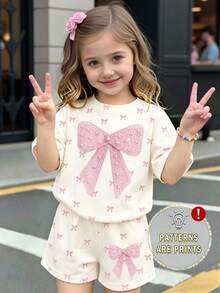 Girls Fresh Fashion Crisp White Base Pink Textured Bow Pattern Print Basic Short T-Shirt And Shorts Set - Multicolor - View 1