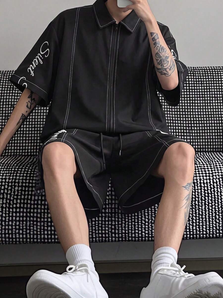 Manfinity Hypemode 男士素色翻領全開襟拉鍊街頭風青年休閒品牌印花寬鬆短袖襯衫與素色寬鬆直筒彈性腰短褲套裝 - 黑色 - 查看 1