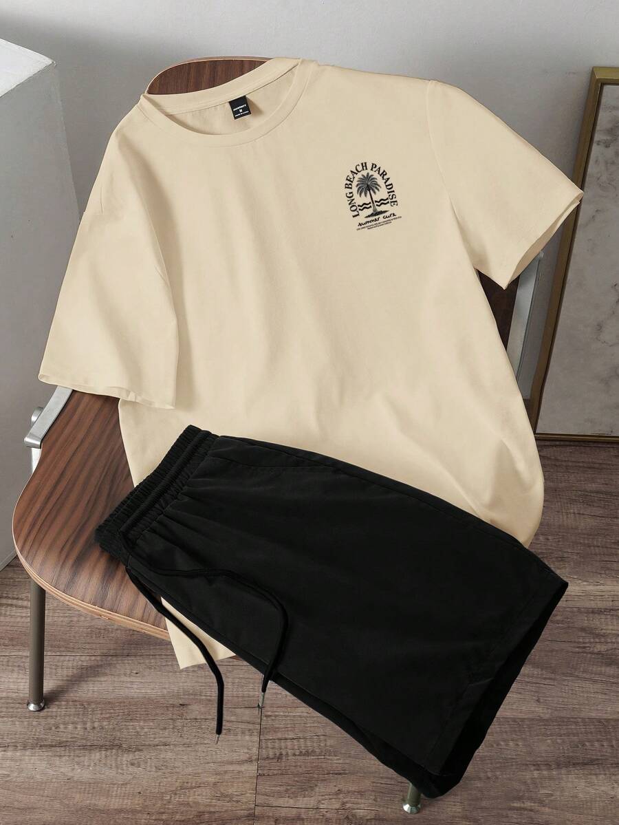 Manfinity Joysei Setelan 2 Potong Pria Ukuran Standar Warna Khaki dengan Motif Huruf dan Pohon Palem serta Celana Pendek Hitam - MultiWarna - View 1