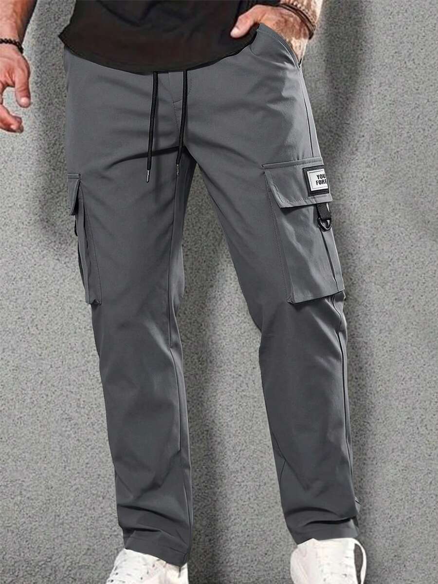 Manfinity CasualCool 男士休閒彈性腰多口袋工裝褲,適合日常休閒穿著、週末出遊、旅行、朋友聚會等。這款長褲是男士衣櫥中不可或缺的多功能單品,也是送給男朋友或丈夫的絕佳禮物。 - 深灰色 - 查看 1