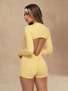 Glamine Mono de mujer amarillo pálido minimalista de manga larga con espalda abierta, mono de gimnasio con fruncido, ropa deportiva de verano sin espalda para entrenamiento y fitness - Amarillo - Ver 1