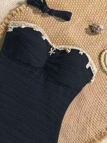 Bonvoyette Traje de baño de una pieza nuevo para mujer primavera/verano, tela texturizada con rayas de ondas azules con diseño de estrella de mar y conchas trenzadas, traje de baño de una pieza adecuado para playa, arena, natación, piscina, vacaciones - Negro - Ver 5