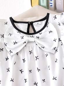 SHEIN Elladie kids 2件組 青少年女孩春夏新款休閒通勤裝，白色圓領波浪條紋蝴蝶結裝飾寬鬆飄逸袖上衣，搭配簡約百搭黑色梭織直筒長褲，適合日常外出 - 黑與白 - 查看 5