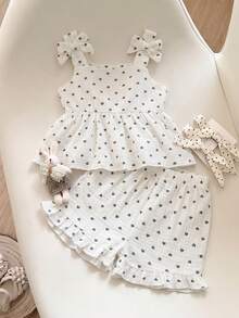 SHEIN Elladie kids 女童 2 件套 蝴蝶結裝飾肩帶拼接下擺背心上衣 愛心圖案印花短褲 舒適純棉 夏季套裝 - 黑與白 - 查看 2